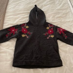 girls black hoodie with floral detailing